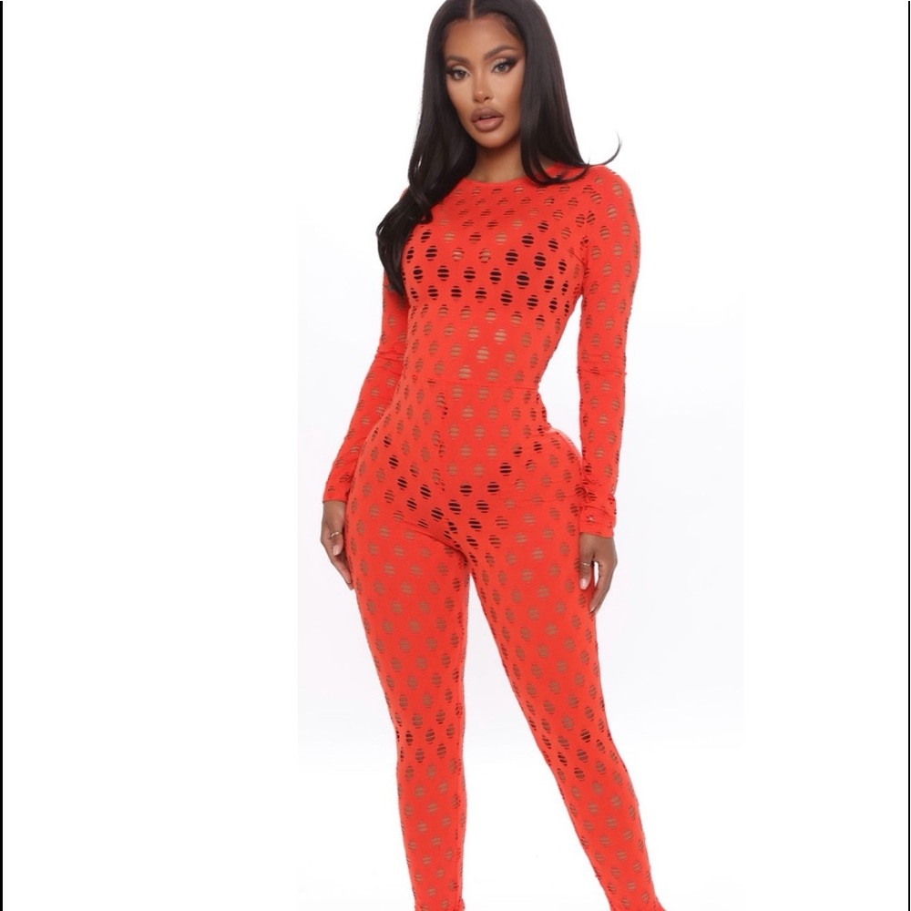 Super stretch jumpsuit. Distressed sheer detail